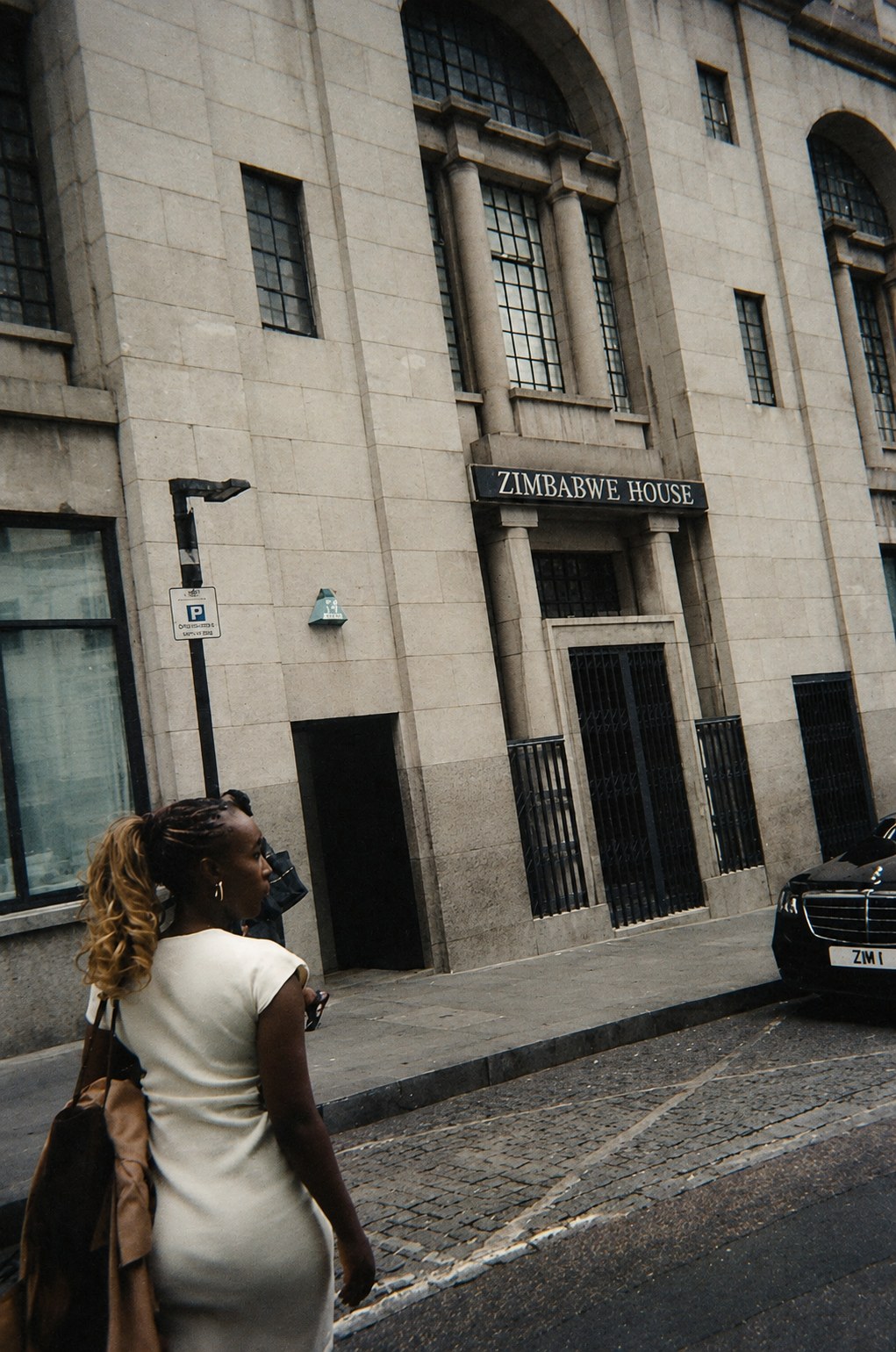 Dr Rumbi Mutenga outside Zimbabwe House, London